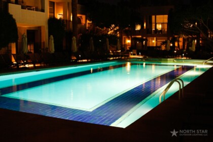 in ground pool and patio lighting