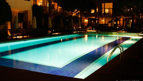 in ground pool and patio lighting