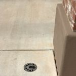 installed lighting fixture in core drilled concrete